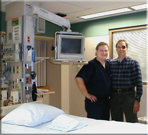 an intensive care room, Pat (left) and Tom